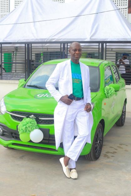 Excitement As Warri Banker Takes Home Glo Brand New Car In Warri